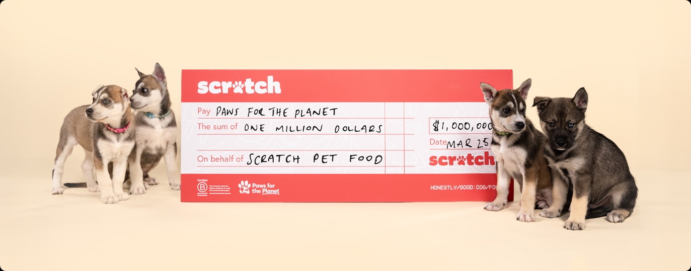 Dogs with donation cheque