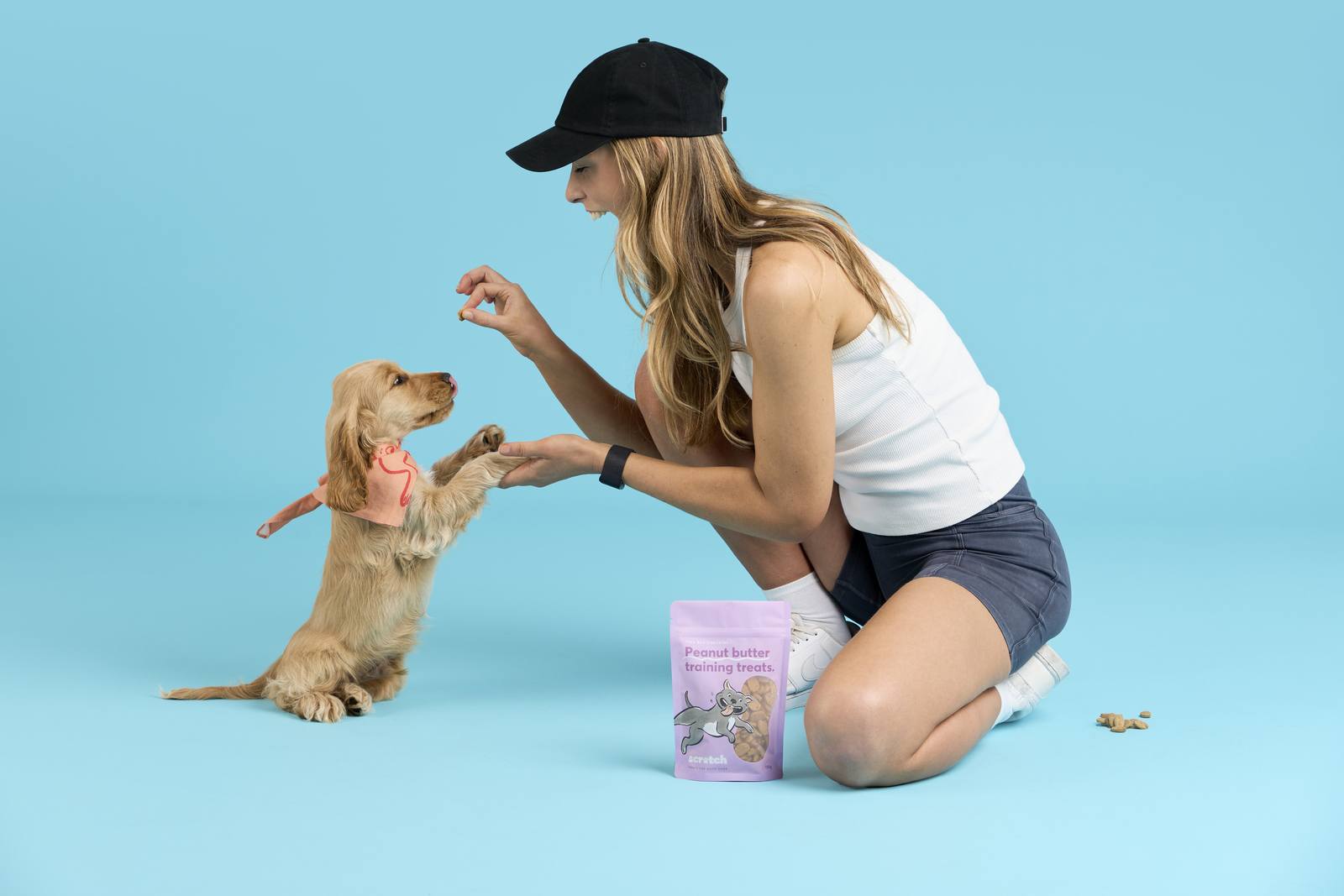 Giving puppy training treats