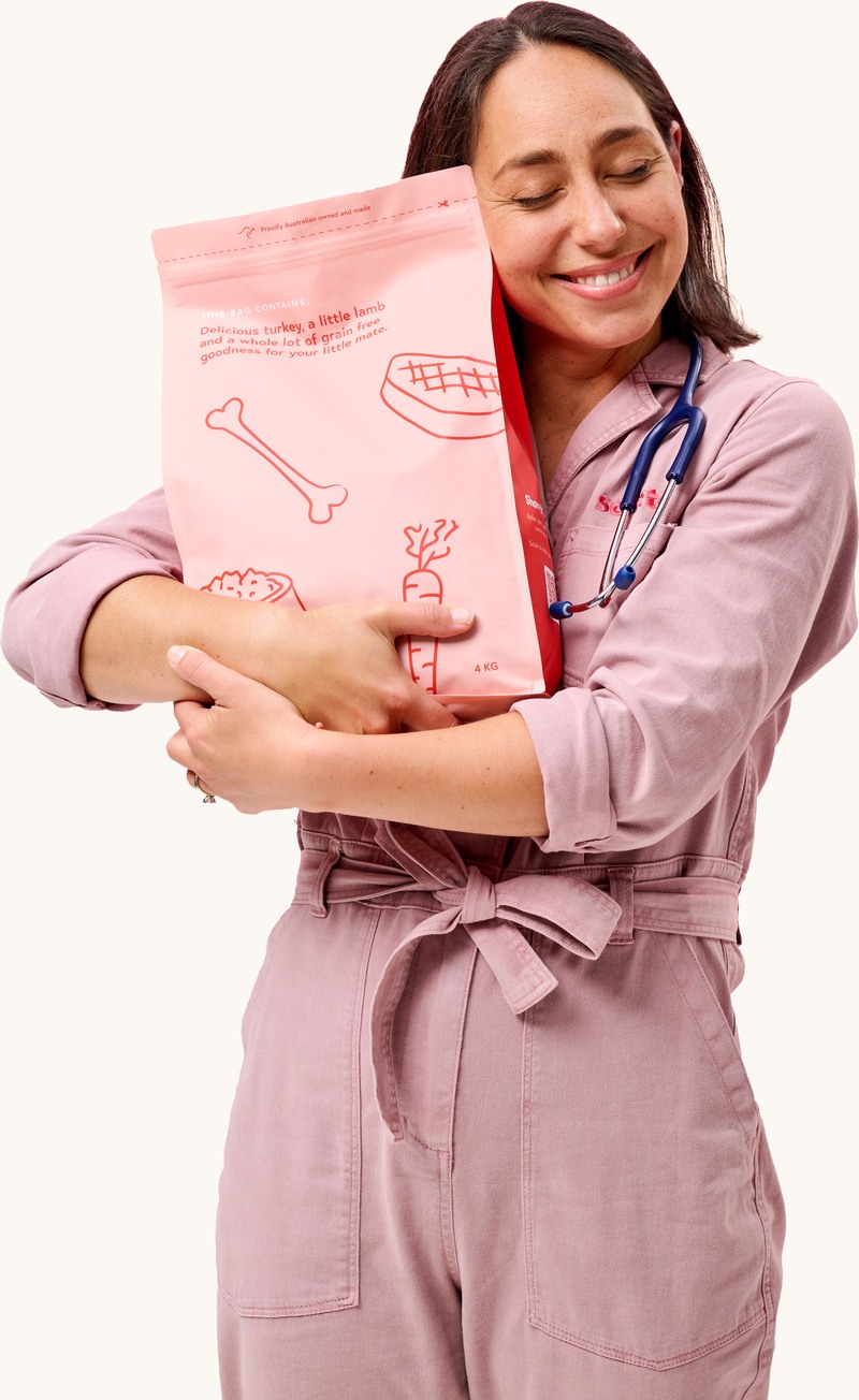 Dr Sam hugging bag of TLB